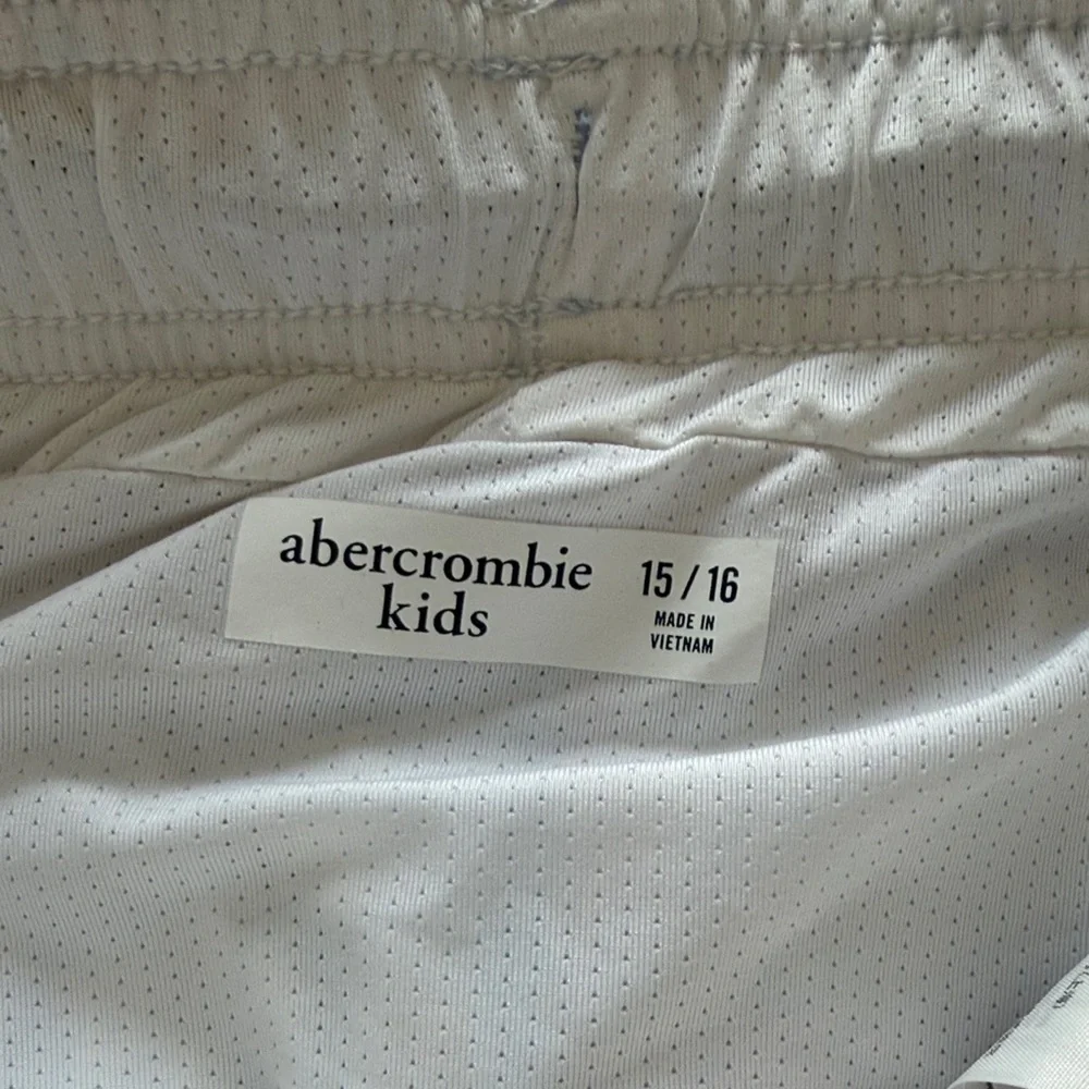 Abercrombie & Fitch Kids Palm Print Swim Trunks in Light Blue, Pink, Cream